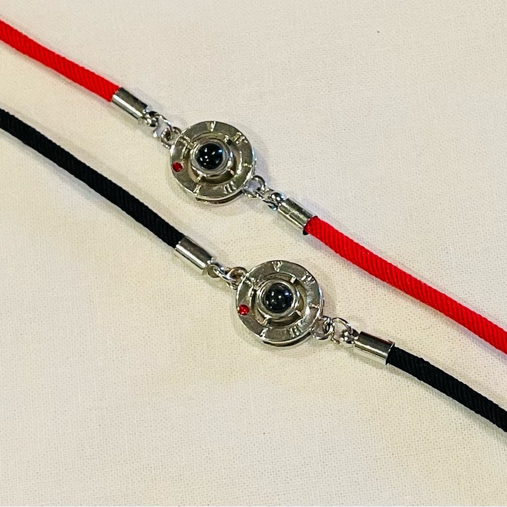 Bracelets - jewel in center with “I love you” written in various languages.